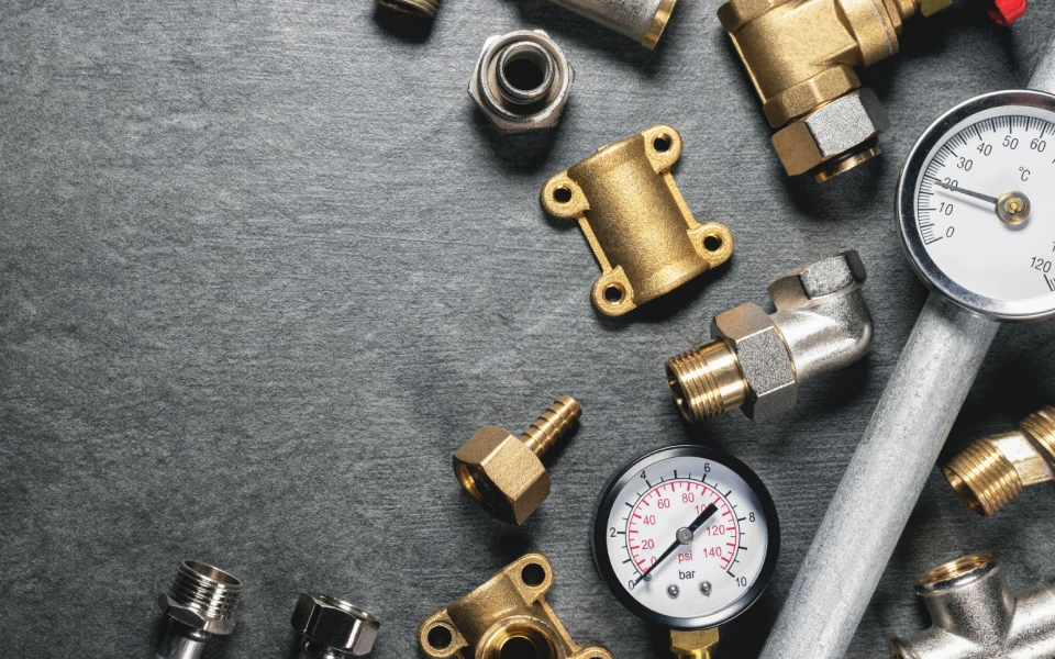 plumbing tools in gray background web